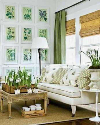 άσπρος καναπές με πράσινα στοιχεία